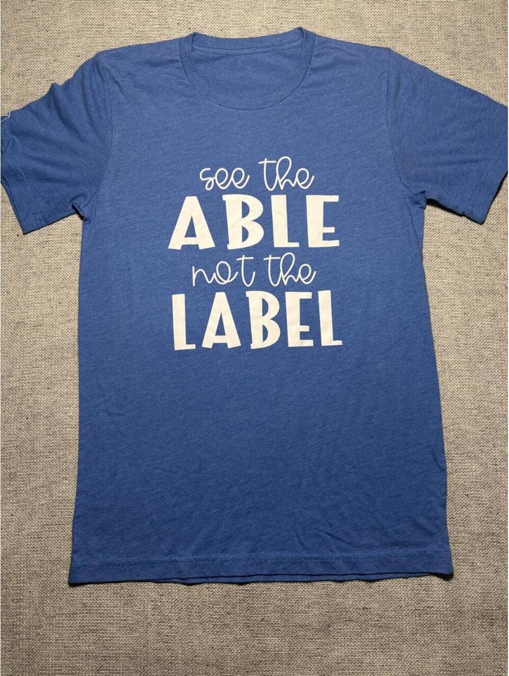 Blue "see the able not the label" t-shirt with white - M - 0376